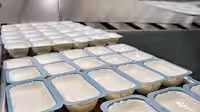 X-ray scanner for complete integration into plastic cup form, fill and seal machines